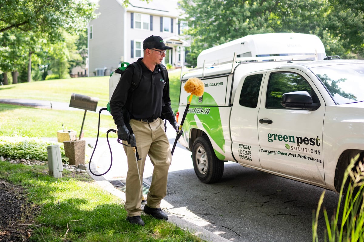 Pest Control Technician Servicing a Home in Chester County, PA